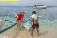 Charlotte disembarking at beach